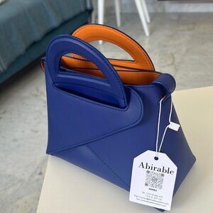 Unique leather reversible  designer bag